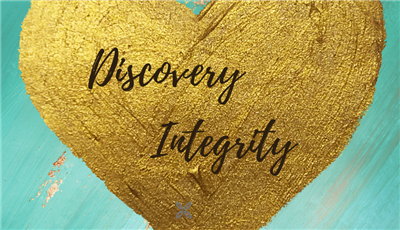 A heart with the words Discvoery and Integrity within